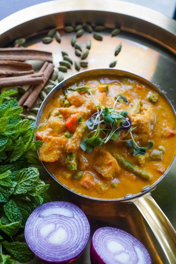Creamy vegetable coconut curry with fresh vegetables