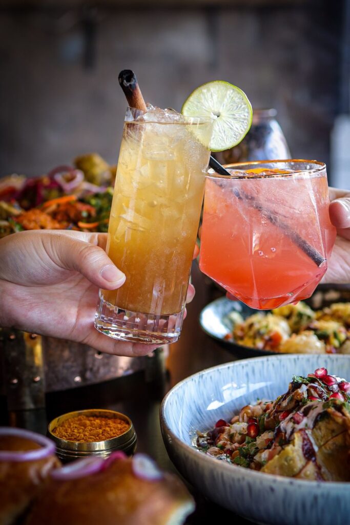 Sula Vancouver: Vibrant Indian Street Food Assortment of vibrant Indian street food dishes, showcasing popular snacks and treats