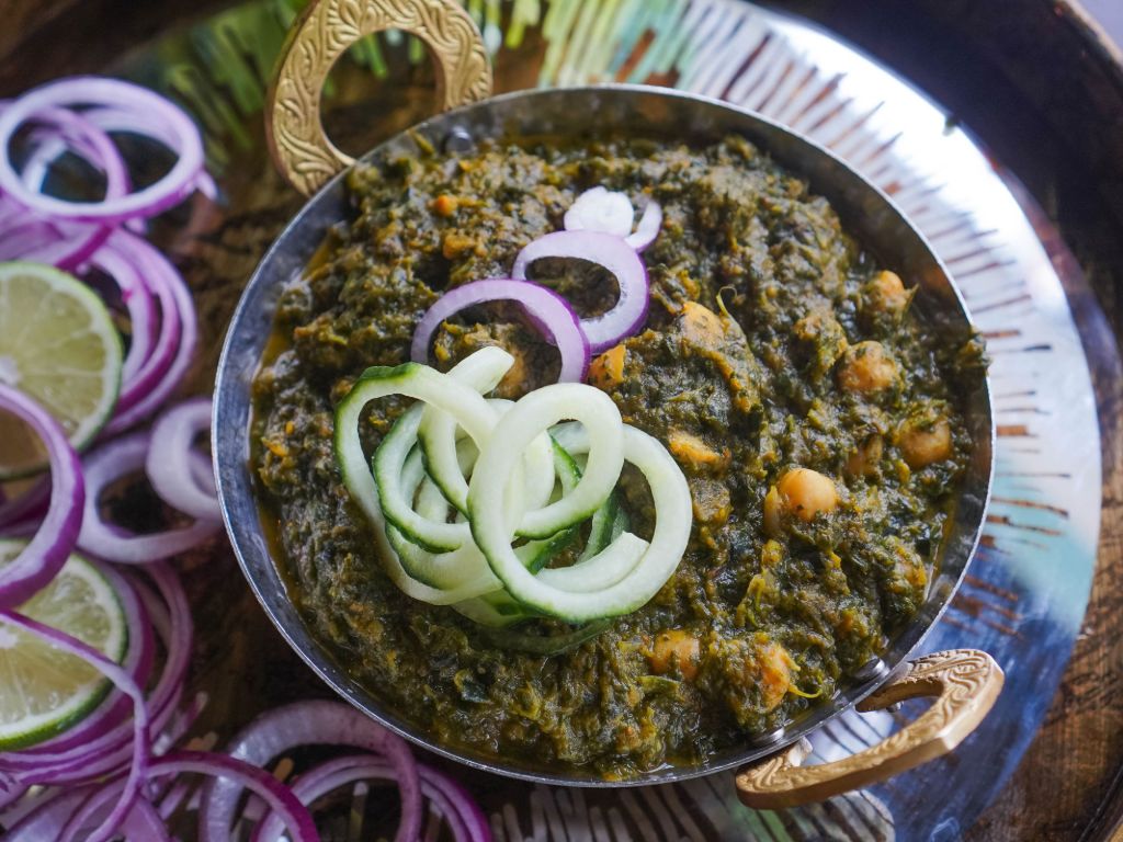 Vibrant channa saag from Sula Main Street in Vancouver.