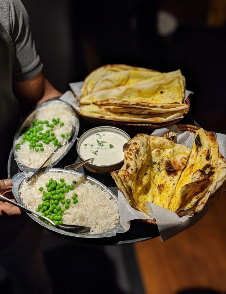 Simple Three Recipes To Learn - Basics Of Indian Cooking rice and garlic naan scaled e1595404431732