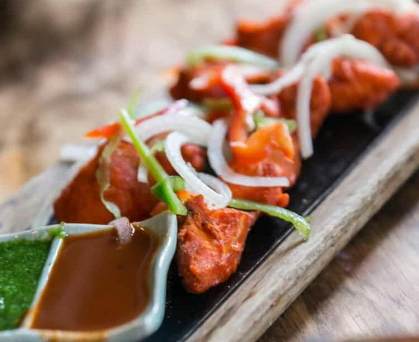Fresh fish pakora served with chutneys 
