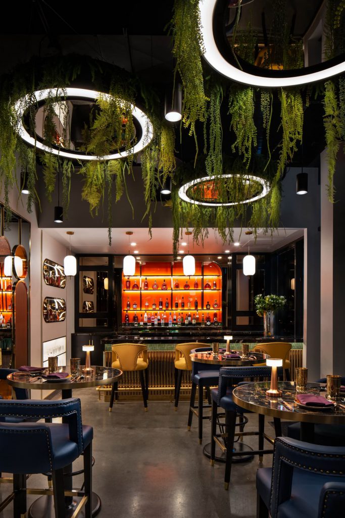 Stylish seating area with unique decor inside Sula Davie Street restaurant.